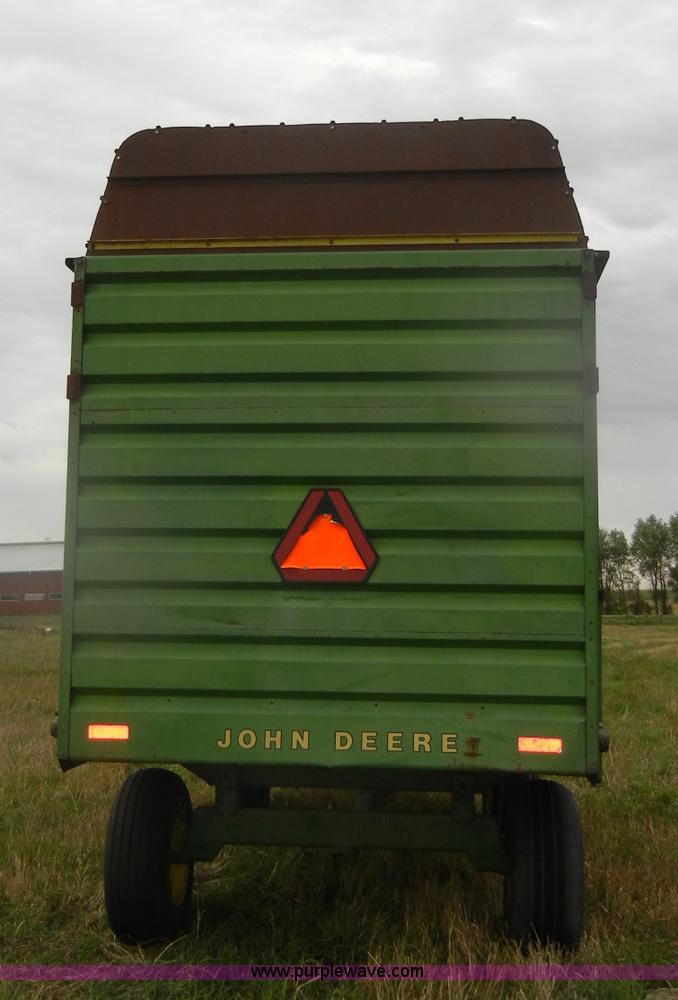 image for item D4320 John Deere 714A forage wagon
