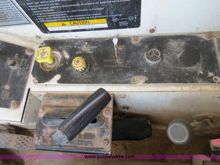 image for item B2442 1996 Oshkosh MPT S2346 front discharge concrete mixer truck