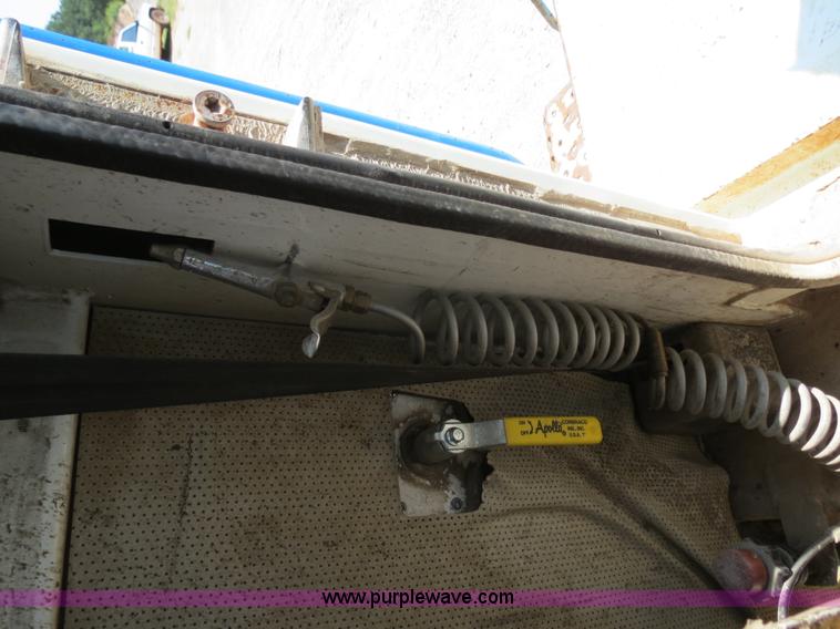 image for item B2442 1996 Oshkosh MPT S2346 front discharge concrete mixer truck