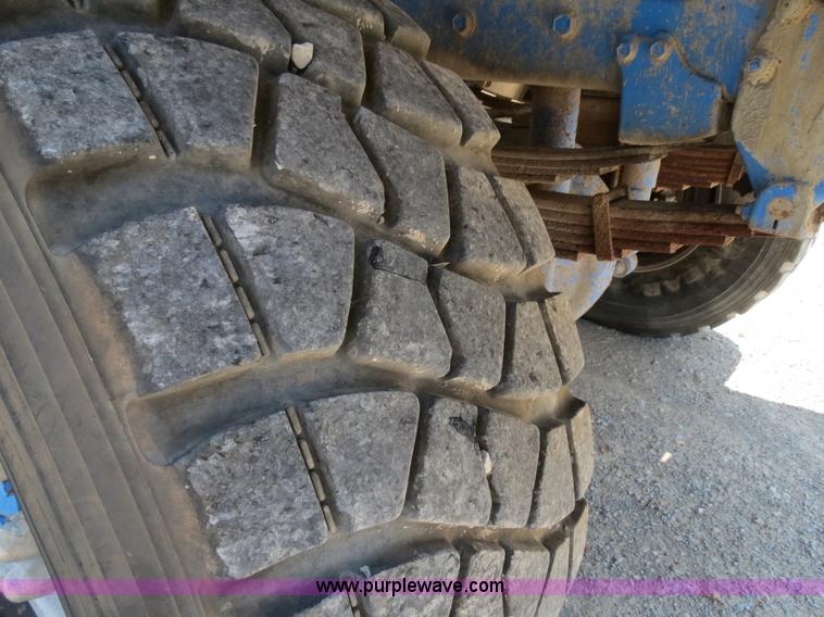 image for item B2442 1996 Oshkosh MPT S2346 front discharge concrete mixer truck