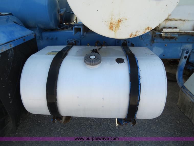 image for item B2442 1996 Oshkosh MPT S2346 front discharge concrete mixer truck