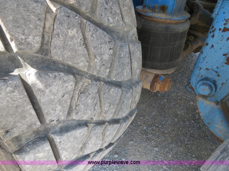 image for item B2442 1996 Oshkosh MPT S2346 front discharge concrete mixer truck