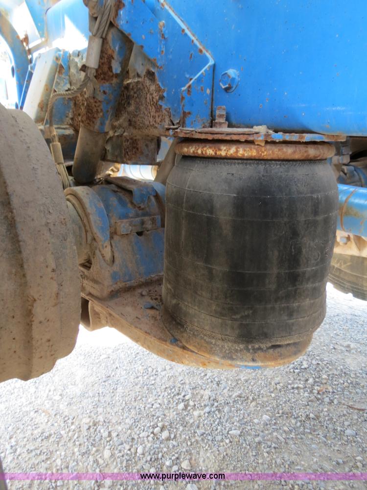 image for item B2442 1996 Oshkosh MPT S2346 front discharge concrete mixer truck