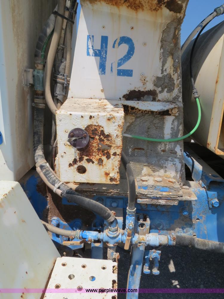 image for item B2442 1996 Oshkosh MPT S2346 front discharge concrete mixer truck