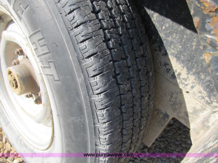 image for item B2789 2004 Stillwater 20' flatbed equipment trailer