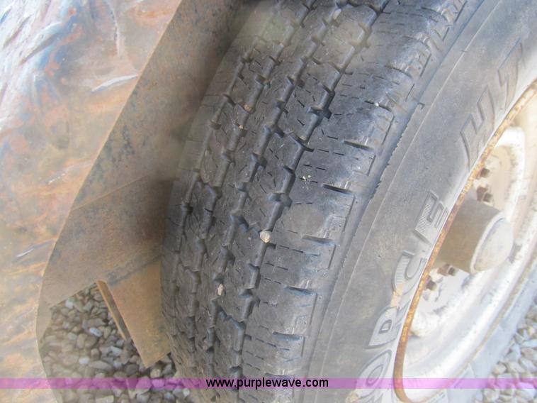 image for item B2789 2004 Stillwater 20' flatbed equipment trailer