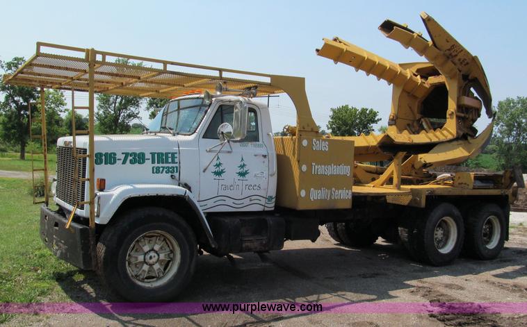 image for item C2147 1987 GMC Brigadier tree spade truck