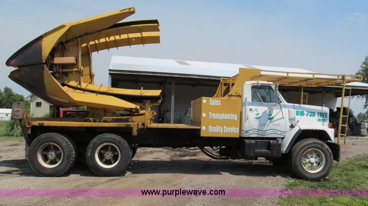 image for item C2147 1987 GMC Brigadier tree spade truck