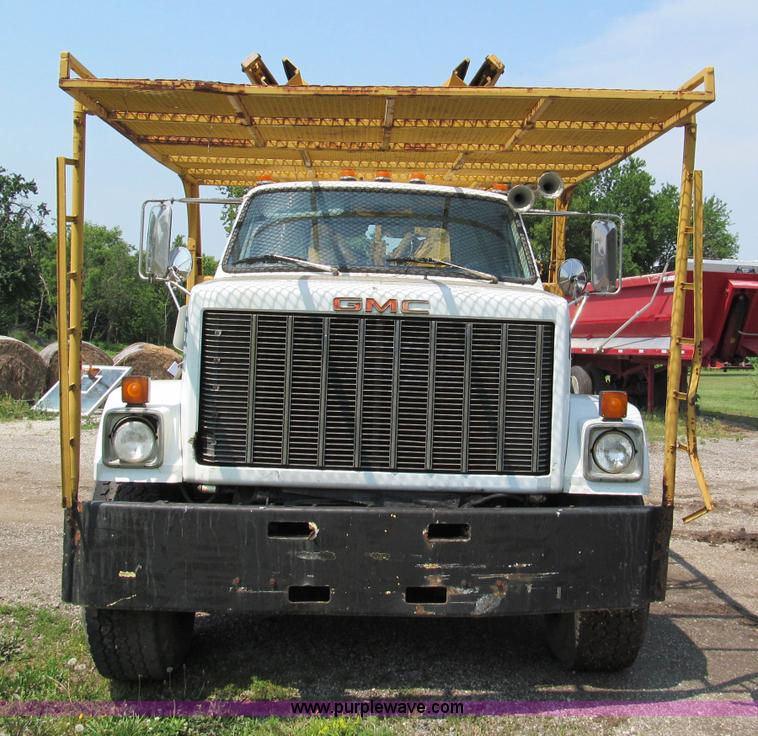 image for item C2147 1987 GMC Brigadier tree spade truck
