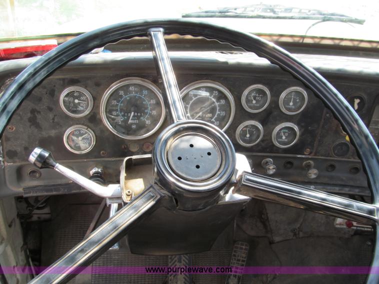 image for item C2147 1987 GMC Brigadier tree spade truck