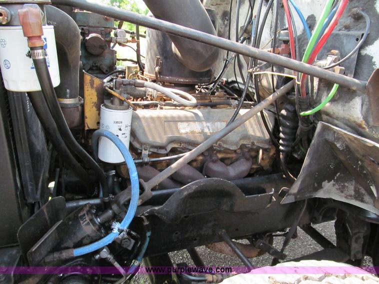 image for item C2147 1987 GMC Brigadier tree spade truck