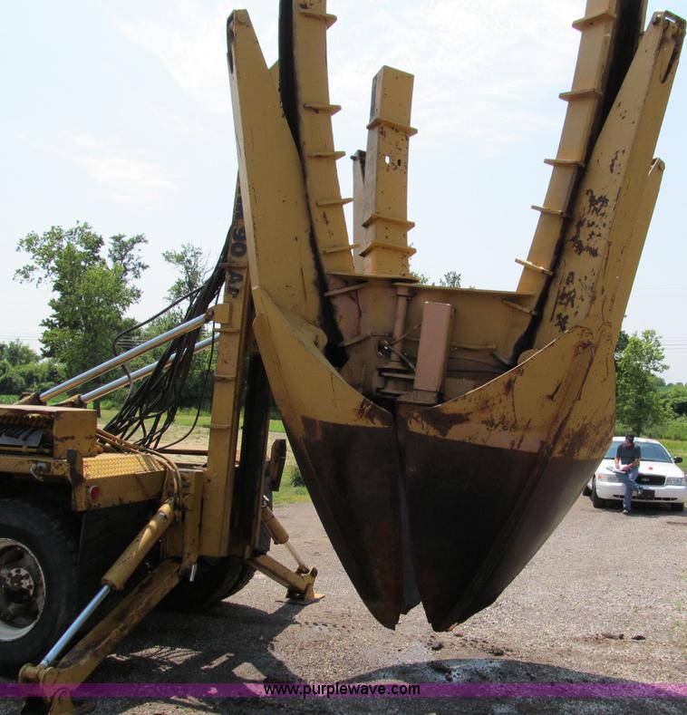 image for item C2147 1987 GMC Brigadier tree spade truck