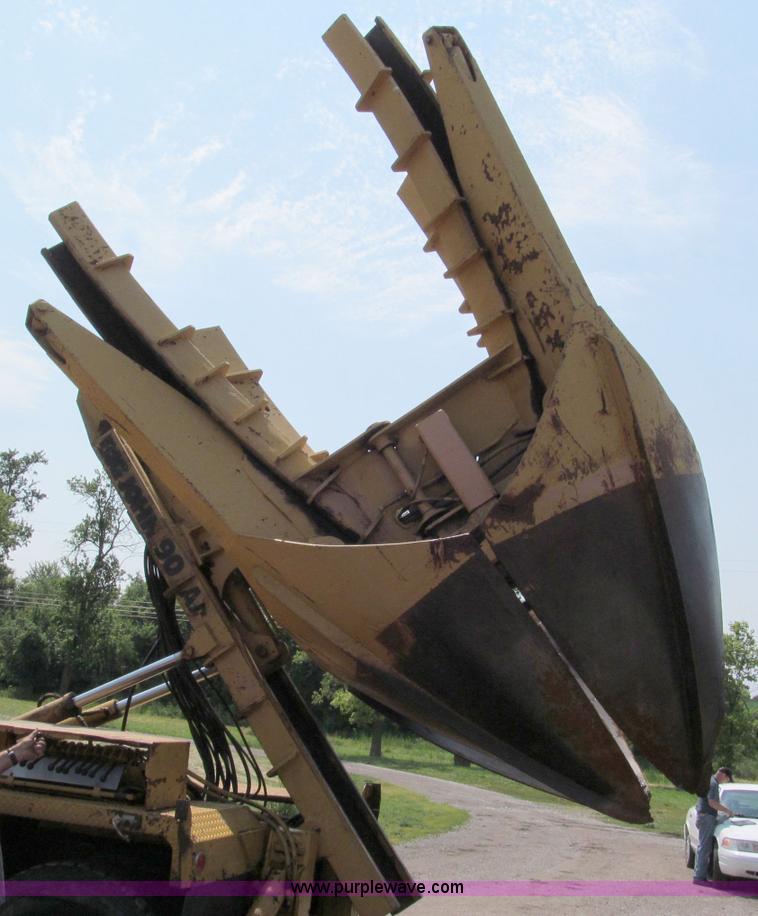 image for item C2147 1987 GMC Brigadier tree spade truck