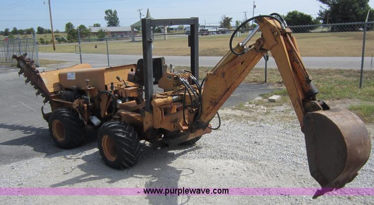 image for item D5595 Case Davis 1448 trencher with backhoe attachment