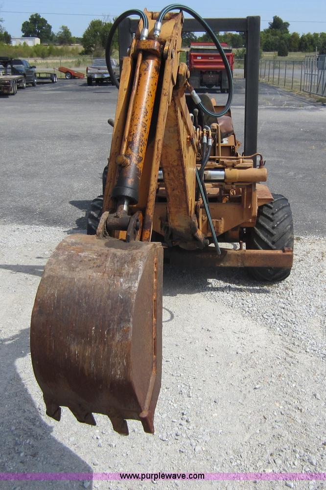 image for item D5595 Case Davis 1448 trencher with backhoe attachment