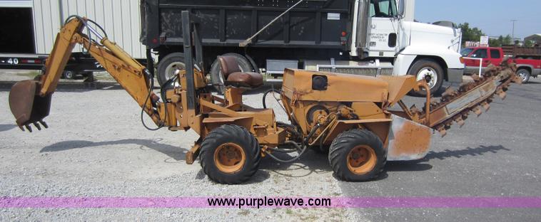 image for item D5595 Case Davis 1448 trencher with backhoe attachment