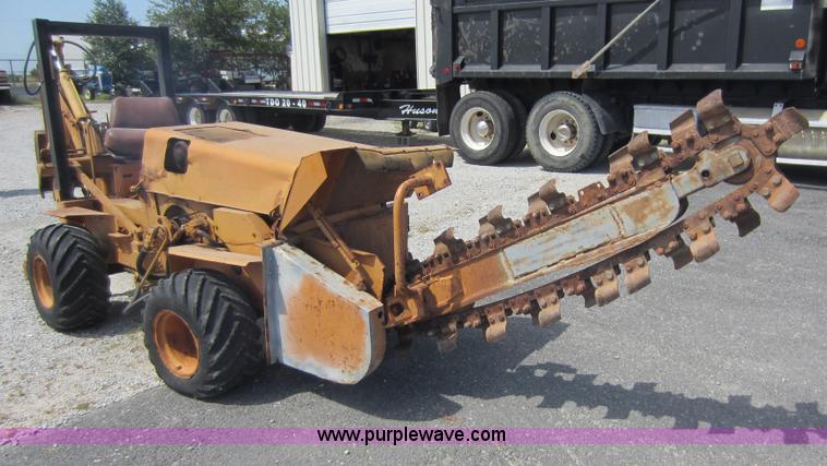 image for item D5595 Case Davis 1448 trencher with backhoe attachment