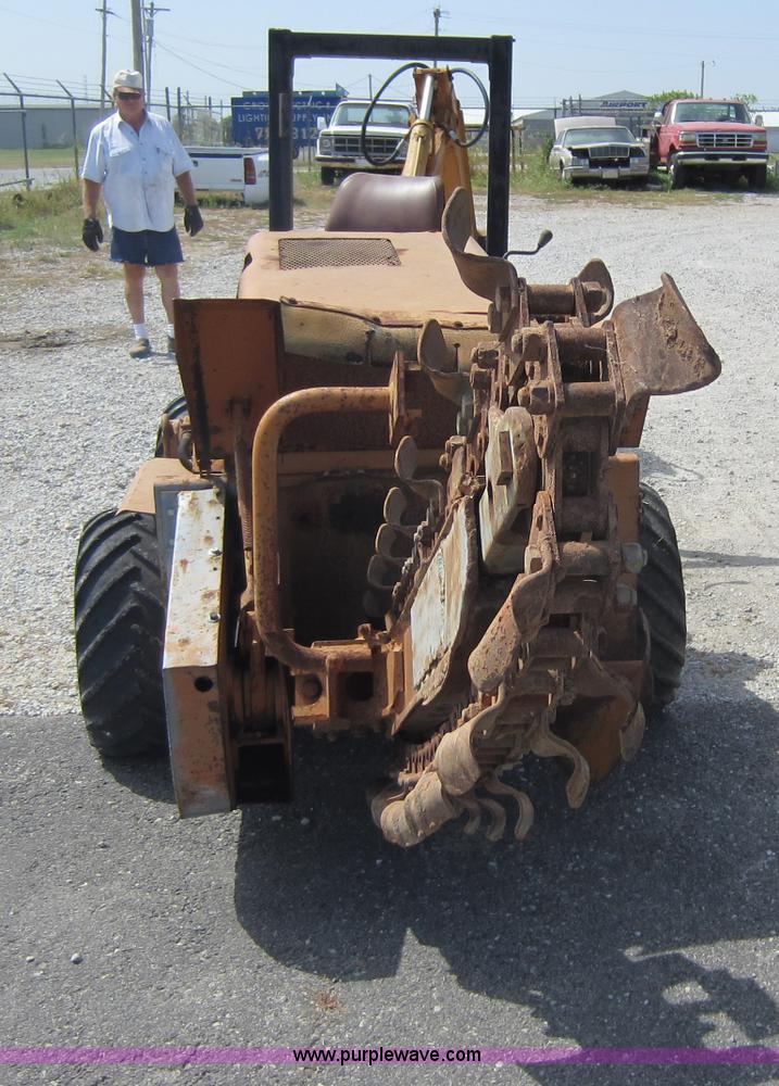 image for item D5595 Case Davis 1448 trencher with backhoe attachment