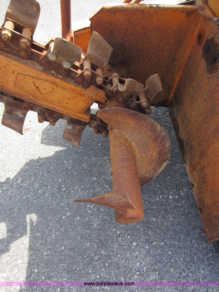 image for item D5595 Case Davis 1448 trencher with backhoe attachment