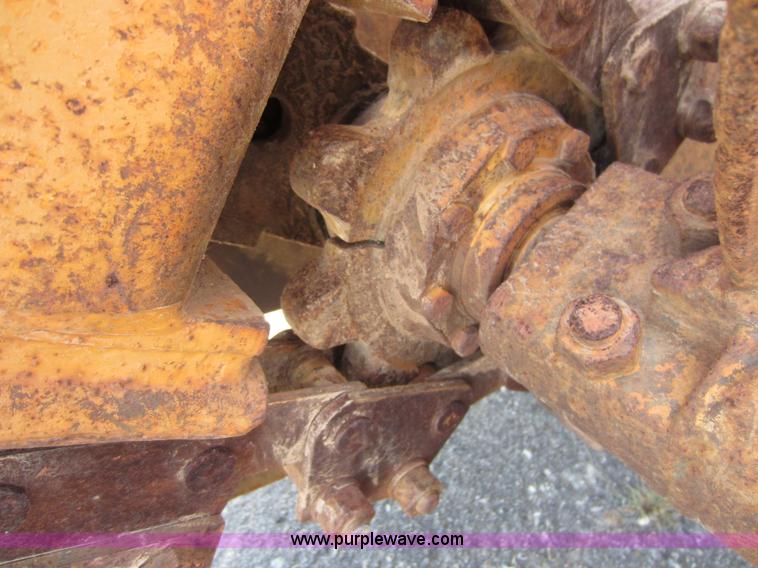 image for item D5595 Case Davis 1448 trencher with backhoe attachment