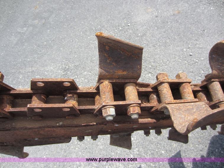 image for item D5595 Case Davis 1448 trencher with backhoe attachment