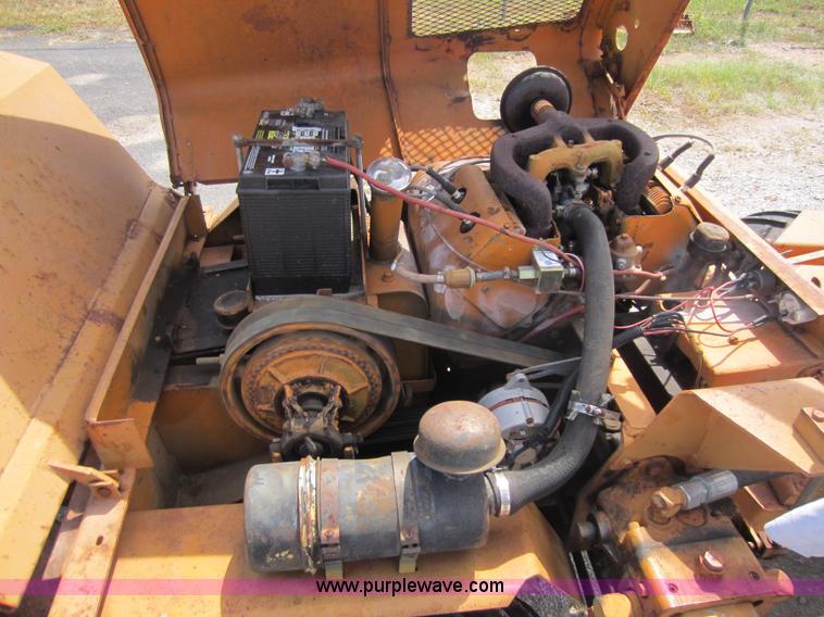 image for item D5595 Case Davis 1448 trencher with backhoe attachment