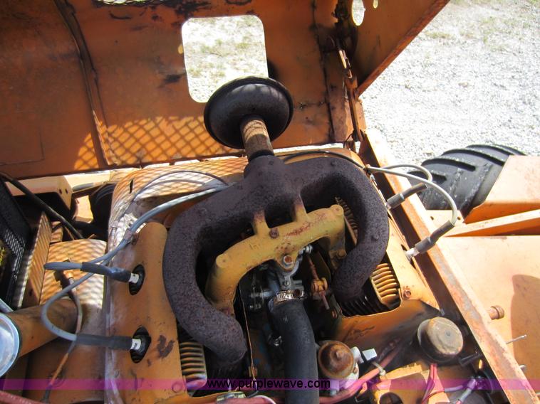 image for item D5595 Case Davis 1448 trencher with backhoe attachment