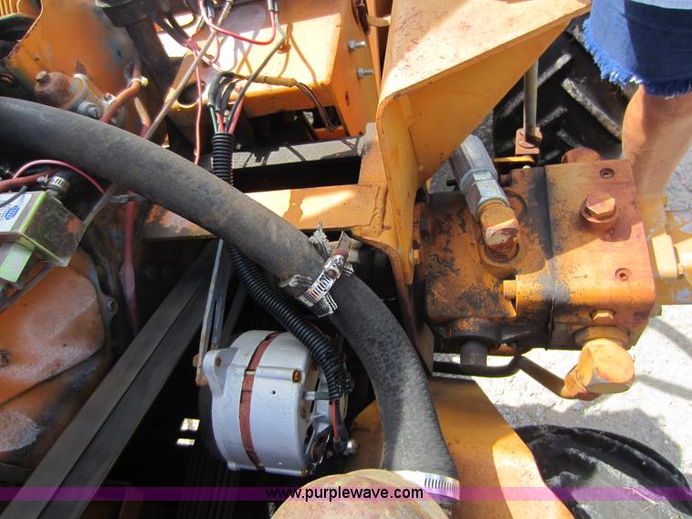 image for item D5595 Case Davis 1448 trencher with backhoe attachment