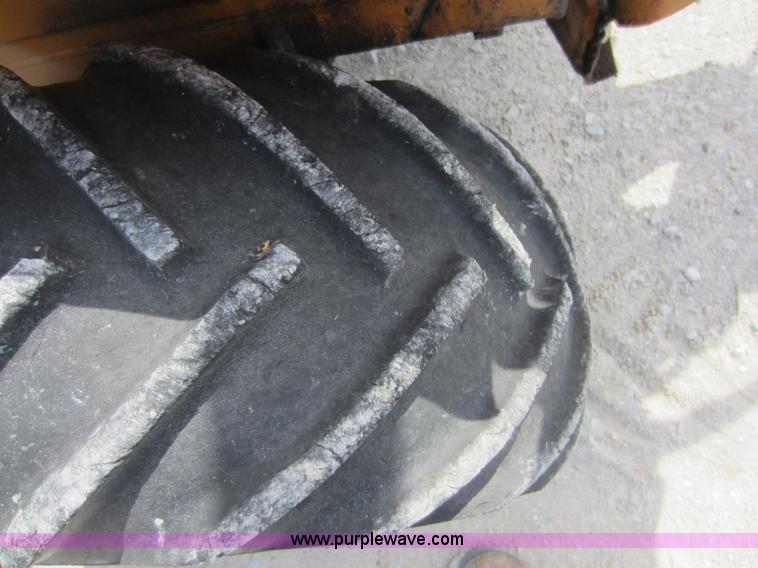 image for item D5595 Case Davis 1448 trencher with backhoe attachment