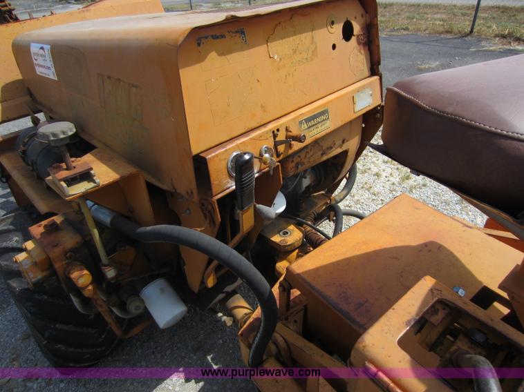 image for item D5595 Case Davis 1448 trencher with backhoe attachment