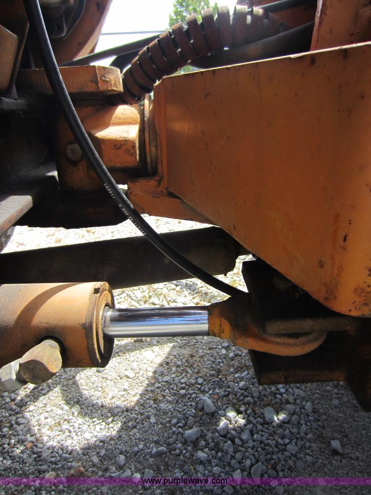 image for item D5595 Case Davis 1448 trencher with backhoe attachment