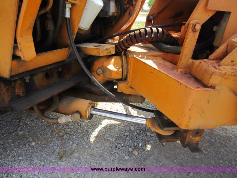 image for item D5595 Case Davis 1448 trencher with backhoe attachment