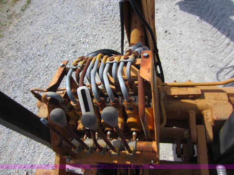image for item D5595 Case Davis 1448 trencher with backhoe attachment