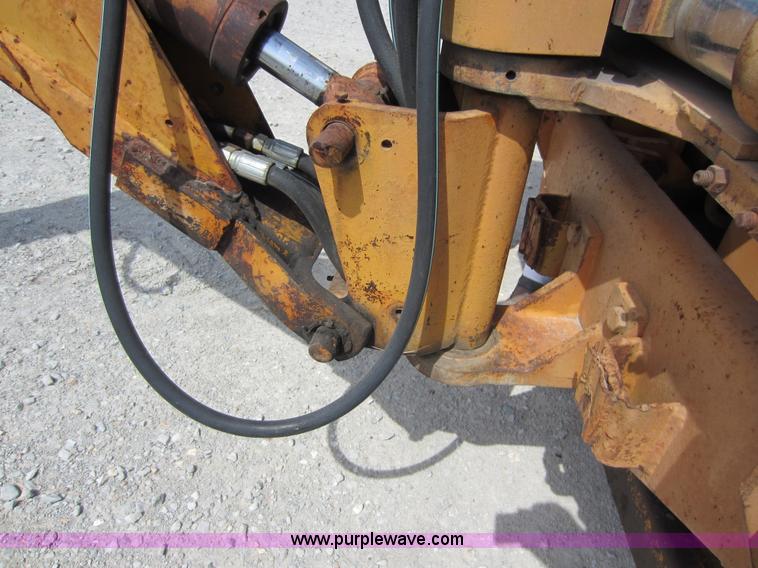 image for item D5595 Case Davis 1448 trencher with backhoe attachment