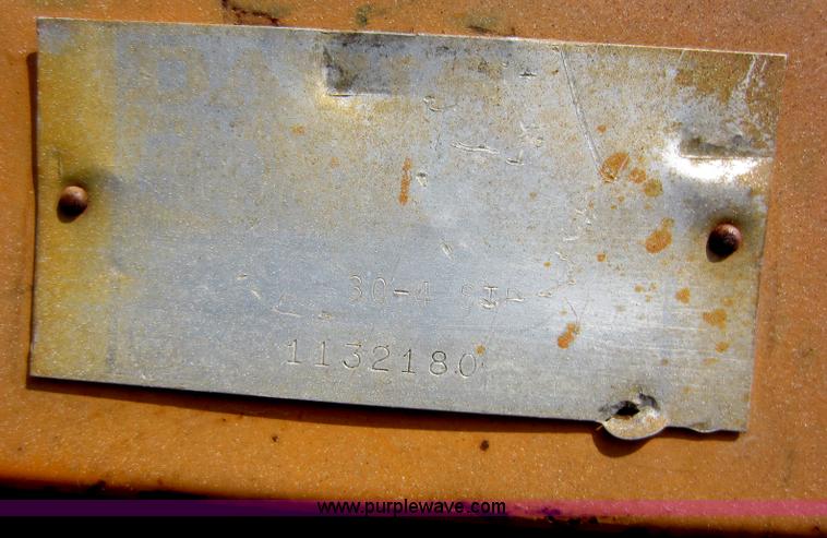 image for item D5595 Case Davis 1448 trencher with backhoe attachment