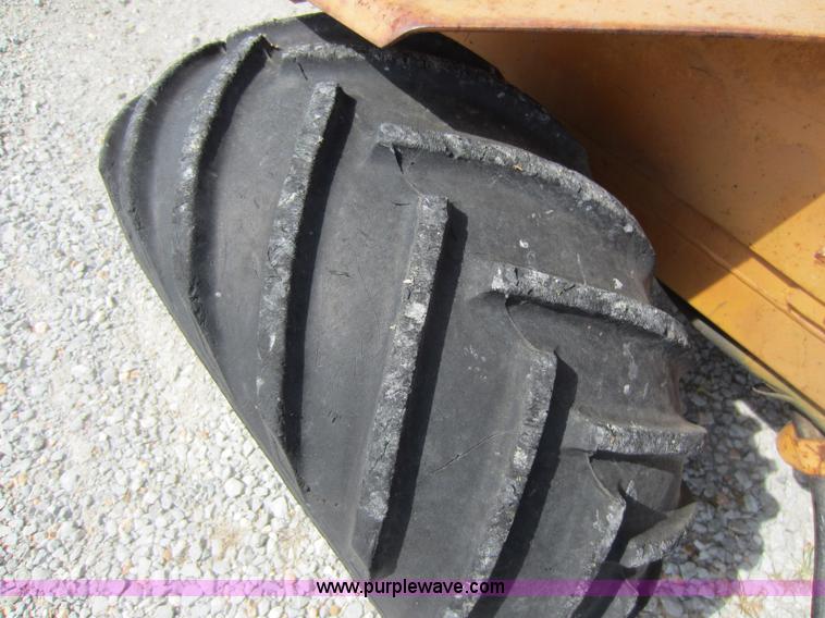 image for item D5595 Case Davis 1448 trencher with backhoe attachment