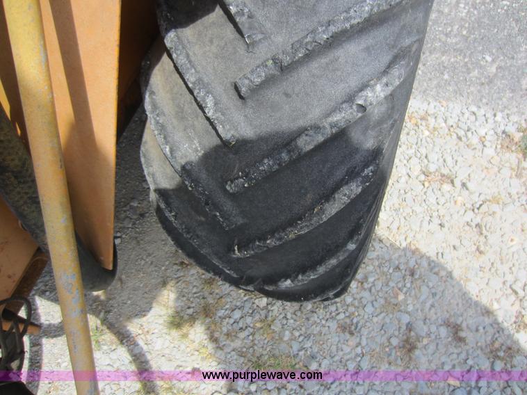 image for item D5595 Case Davis 1448 trencher with backhoe attachment