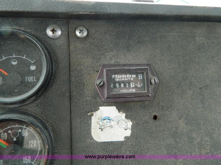 image for item B3678 1994 Mack RD690S roll off truck