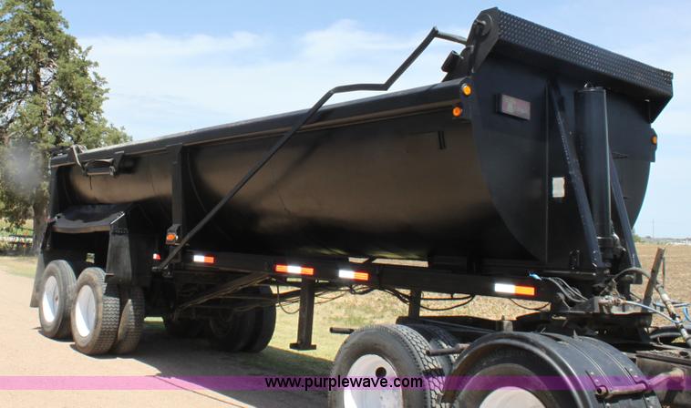 image for item B7389 2000 Travis barrel end dump trailer