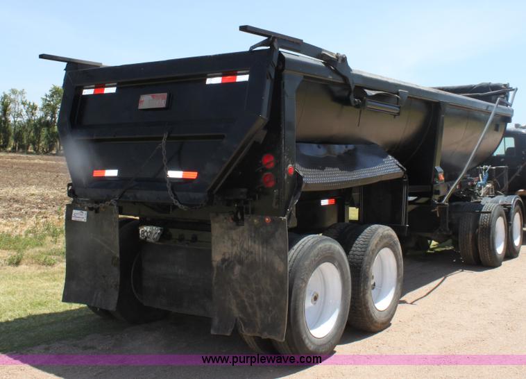 image for item B7389 2000 Travis barrel end dump trailer