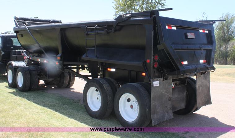 image for item B7389 2000 Travis barrel end dump trailer