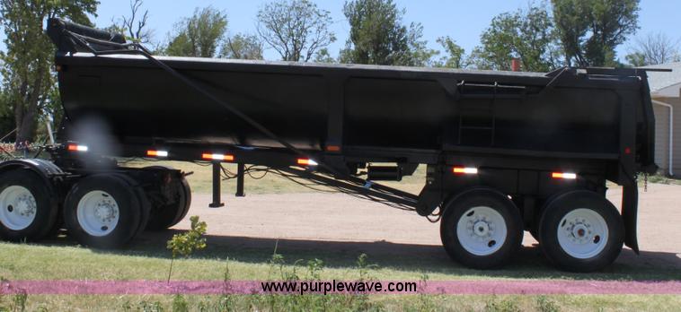 image for item B7389 2000 Travis barrel end dump trailer