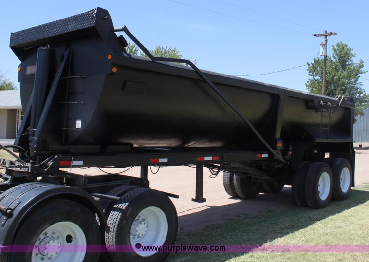image for item B7389 2000 Travis barrel end dump trailer
