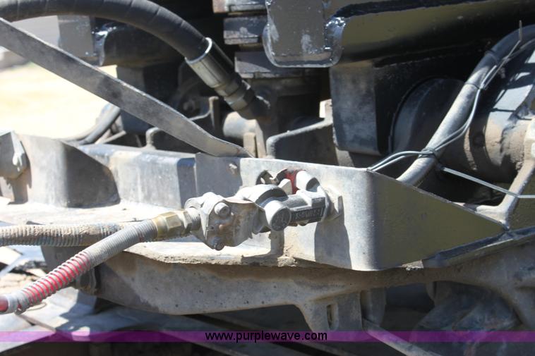 image for item B7389 2000 Travis barrel end dump trailer