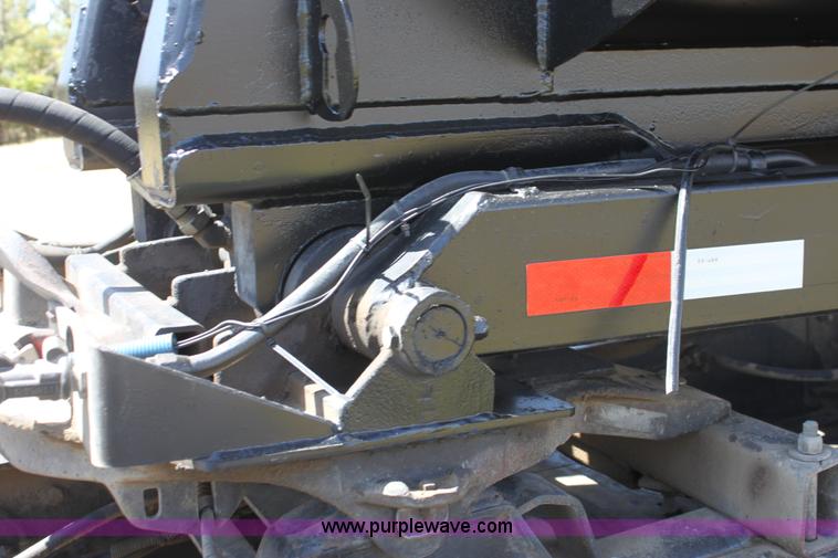 image for item B7389 2000 Travis barrel end dump trailer