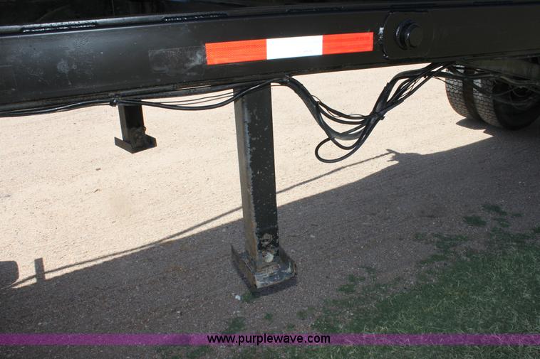 image for item B7389 2000 Travis barrel end dump trailer