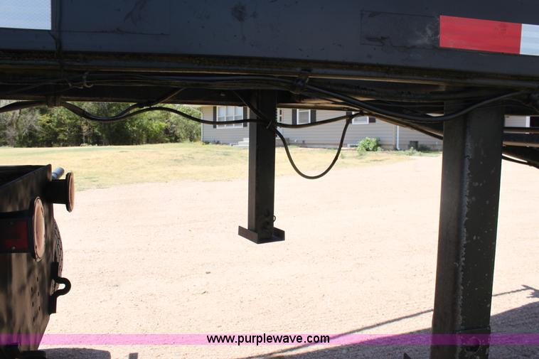 image for item B7389 2000 Travis barrel end dump trailer