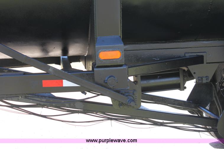 image for item B7389 2000 Travis barrel end dump trailer