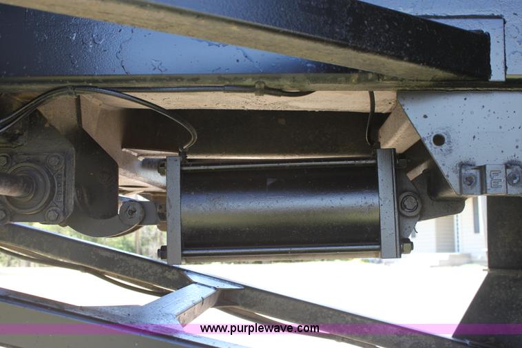 image for item B7389 2000 Travis barrel end dump trailer