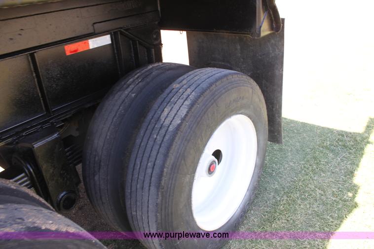 image for item B7389 2000 Travis barrel end dump trailer